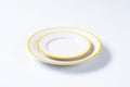 Yellow and white dinner plates Royalty Free Stock Photo