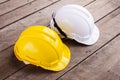 Yellow, white hard safety helmet construction hat for safety pro Royalty Free Stock Photo