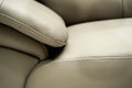 Yellow white leather sofa, close up detail. Furniture showroom photography