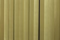 Yellow white plastic strips curtain. Royalty Free Stock Photo
