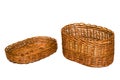 Yellow wicker basket made from a vine on a white background Royalty Free Stock Photo