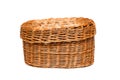 Yellow wicker basket made from a vine on a white background Royalty Free Stock Photo