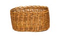 Yellow wicker basket made from a vine on a white background Royalty Free Stock Photo