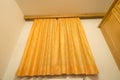 Yellow window curtain