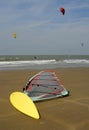 Yellow windsurf lying on the beach Royalty Free Stock Photo