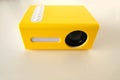 yellow wireless projector, movie projector, Full HD with Bluetooth for video playback, watching movies for home and office Royalty Free Stock Photo