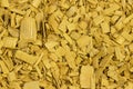 Yellow wood chips texture, wooden decorative background. Royalty Free Stock Photo