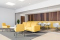 Yellow and wood office lounge corner, yellow sofas Royalty Free Stock Photo