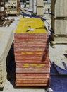 yellow wood panels, trowel and other materials stacked