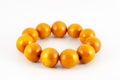 Yellow wooden beads bracelet Royalty Free Stock Photo