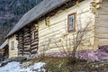 Yellow wooden house in Vlkolinec village Royalty Free Stock Photo