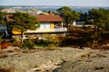 Yellow wooden hytte and view on fjord, Norway Royalty Free Stock Photo