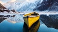 Yellow wooden rowing boat on a calm lake in winter landscape Royalty Free Stock Photo