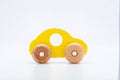 Yellow wooden toy car Royalty Free Stock Photo