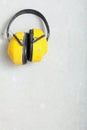 Yellow working protective headphones noise muffs Royalty Free Stock Photo