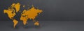 Yellow world map on black concrete wall background. 3D illustration. Horizontal banner Royalty Free Stock Photo