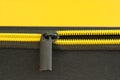 Yellow zipper close-up. Detail of a suitcase.