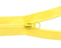 Yellow zipper on white background, top view