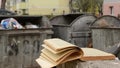 Yellowed Book and Dumpster