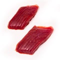 Yellowfin tuna fish steaks isolated on a white background Royalty Free Stock Photo