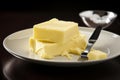 Yellowish Plate piece butter. Generate AI Royalty Free Stock Photo