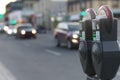 Deep Bokeh Parking meters on Franklin avenue in Yellowknife, Canada Royalty Free Stock Photo