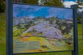 YELLOWSTONE, MONTANA, USA JUNE 02, 2018: Above view of group of people walking in a boardwalk in Mammoth hot springs