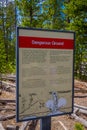 YELLOWSTONE, MONTANA, USA JUNE 02, 2018: Outdoor view of informative sign of dangerous ground area, of places people