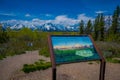 YELLOWSTONE, MONTANA, USA MAY 24, 2018: Close up of informative sign of Teton range and the valley mountains landscape