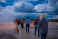 YELLOWSTONE, MONTANA, USA MAY 24, 2018: Crowd of tourists take pictures of Grand Prismatic Spring in Yellowstone Royalty Free Stock Photo