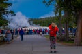 YELLOWSTONE, MONTANA, USA MAY 24, 2018: Outdoor view of crowd of tourists watching and taking pictures of the Old Royalty Free Stock Photo