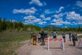 YELLOWSTONE, MONTANA, USA MAY 24, 2018: Unidentified people most them photographers taking pictures and enjoying the