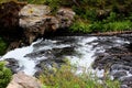 Yellowstone National Park Beautiful Bridge with rocks and moss and woodlands gorgeous colors Royalty Free Stock Photo