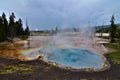 Yellowstone national park blue geothermal pool steaming hot spring Royalty Free Stock Photo