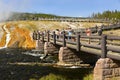 YELLOWSTONE NATIONAL PARK, WYOMING, USA - AUGUST 23, 2017: Tourists walking on the path to the Grand Prismatic Geyser Basin
