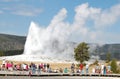 Yellowstone - Old Faithful erupting, crowd