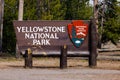 South entrance sign into Yellowstone National Park in western Wyoming during spring. Royalty Free Stock Photo