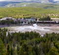 Yellowstone, Wyoming, USA, May, 25, 2021, tourists in the Upper Geyser Basin watching Old Faithful