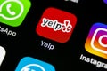 Yelp application icon on Apple iPhone X screen close-up. Yelp app icon. Yelp.com application. Social network. Social media Royalty Free Stock Photo