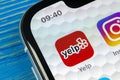 Yelp application icon on Apple iPhone X screen close-up. Yelp app icon. Yelp.com application. Social network. Social media Royalty Free Stock Photo