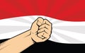 Yemen fight protest symbol with strong hand and flag as background