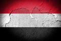 Yemen flag on cracked wall