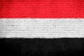 Yemen flag painted on brick wall. National country flag background photo