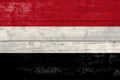 Yemen flag on a wooden surface. Yemen grunge flag