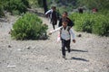 A Yemeni child runs to school