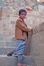 A yemeni child in Thula, fortified city, village, cistern, stairs, Republic of Yemen, daily life