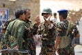 Yemeni military men talk at the security checkpoint, Hadramaut valley, Yemen.