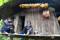 Yen Bai, Vietnam - Sep 17, 2016: Hmong ethnic minority women sewing clothing at their house