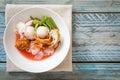 (Yen-Ta-Four) - Thai Style Noodle with assorted tofu and fish ball in Red Soup Royalty Free Stock Photo