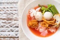 (Yen-Ta-Four) - Thai Style Noodle with assorted tofu and fish ball in Red Soup Royalty Free Stock Photo